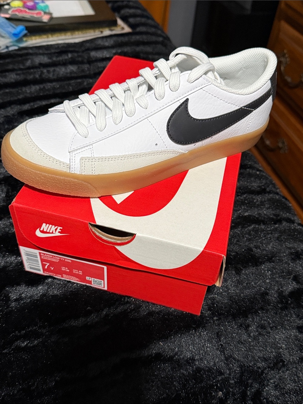 Nike Blazer Low 77 GS White Low-Top Sneakers with Black Swoosh and Gum Sole